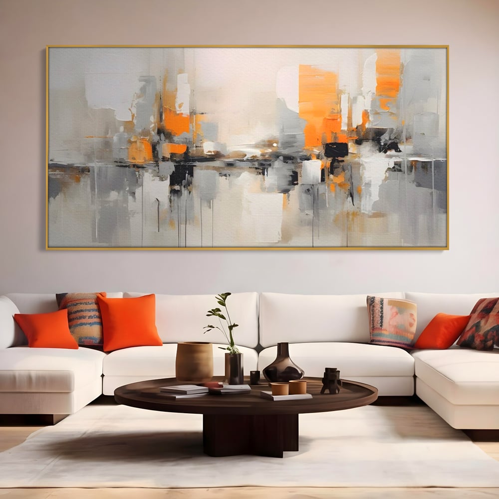 Tablou canvas cu pictura abstracta cu reflexii urbane, in rama de aluminiu auriu, pe perete intr-un living